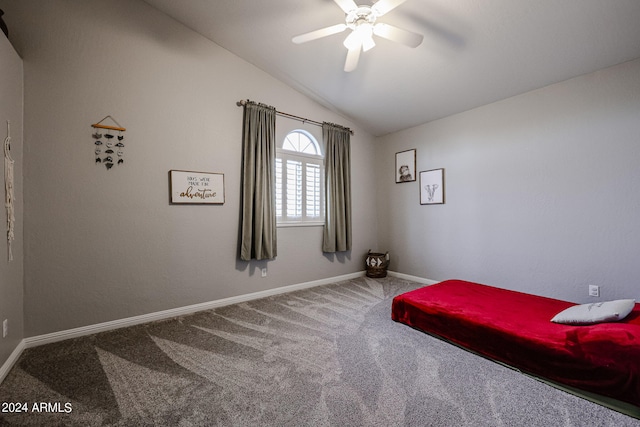 carpeted bedroom with lofted ceiling and ceiling fan