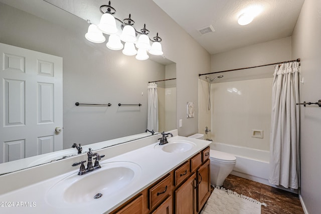 full bathroom with vanity, toilet, shower / bathtub combination with curtain, and a textured ceiling