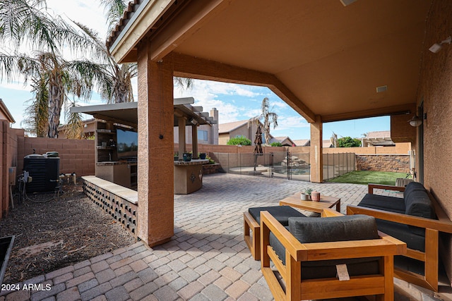 view of patio with central AC