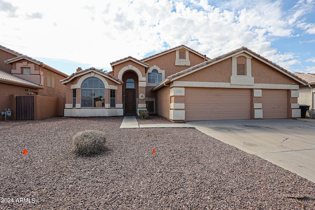 view of front of property featuring a garage