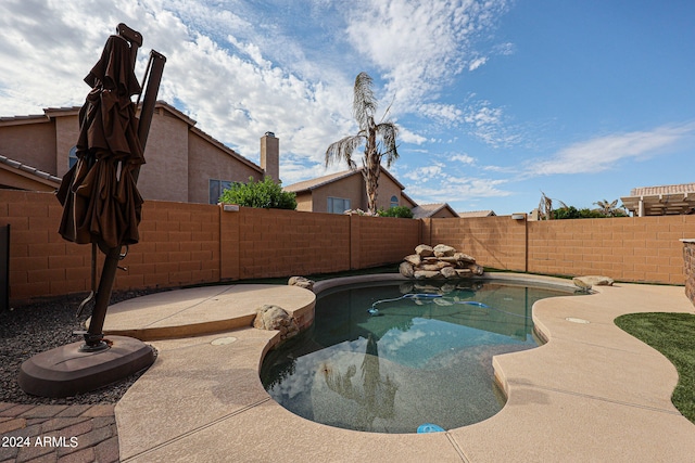 view of pool featuring a patio