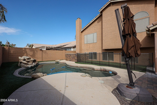 view of pool with a patio area