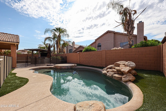 view of swimming pool with a patio area