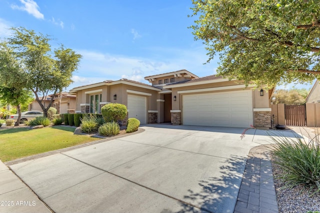 view of front of home featuring a garage and a front lawn