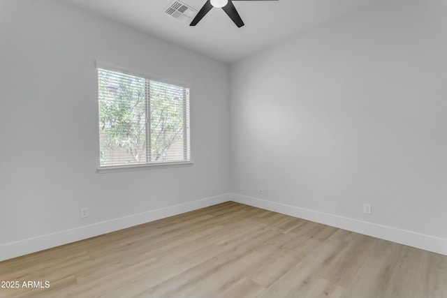 unfurnished room with ceiling fan and light hardwood / wood-style flooring