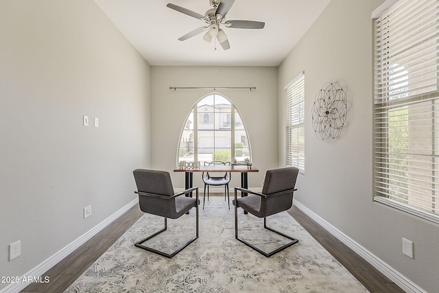 3310 E Los Gatos Dr, Phoenix, AZ 85050 - sitting room with wood finished floors, ceiling fan, and baseboards