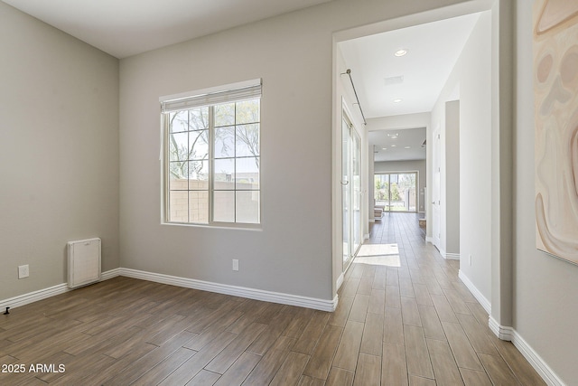 3310 E Los Gatos Dr, Phoenix, AZ 85050 - corridor featuring wood finished floors, baseboards, and recessed lighting