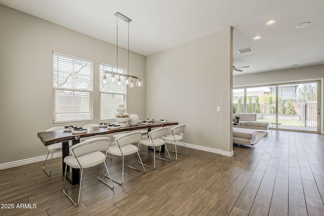 3310 E Los Gatos Dr, Phoenix, AZ 85050 - dining room with wood finished floors, baseboards, recessed lighting, ceiling fan, and a chandelier