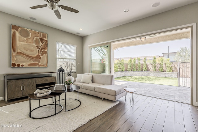 3310 E Los Gatos Dr, Phoenix, AZ 85050 - living room featuring a ceiling fan, wood finished floors, recessed lighting, and baseboards