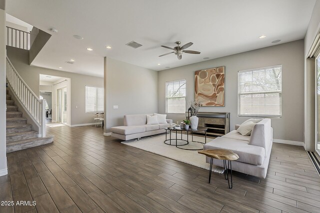 3310 E Los Gatos Dr, Phoenix, AZ 85050 - living room with a ceiling fan, wood finished floors, baseboards, stairs, and recessed lighting
