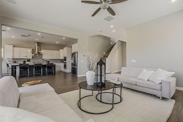 3310 E Los Gatos Dr, Phoenix, AZ 85050 - living room featuring dark wood-style floors, stairway, a ceiling fan, recessed lighting, and baseboards