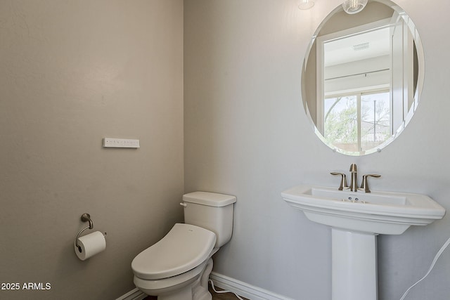 3310 E Los Gatos Dr, Phoenix, AZ 85050 - half bathroom featuring toilet and a sink