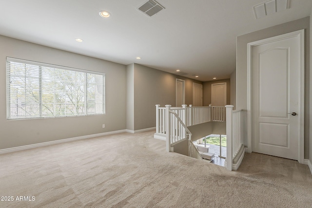 3310 E Los Gatos Dr, Phoenix, AZ 85050 - unfurnished room with carpet, baseboards, and recessed lighting