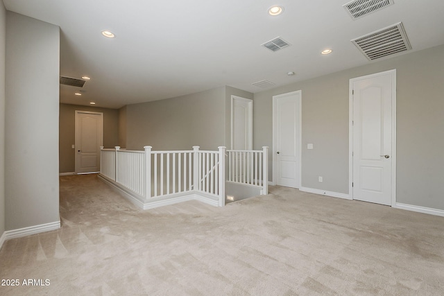 3310 E Los Gatos Dr, Phoenix, AZ 85050 - carpeted empty room featuring baseboards and recessed lighting