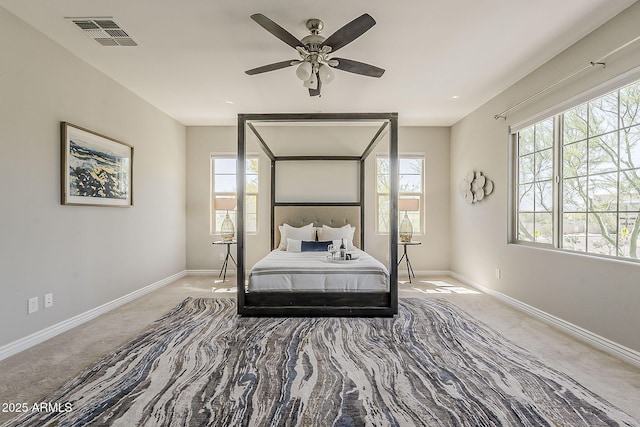 3310 E Los Gatos Dr, Phoenix, AZ 85050 - carpeted bedroom featuring baseboards and a ceiling fan