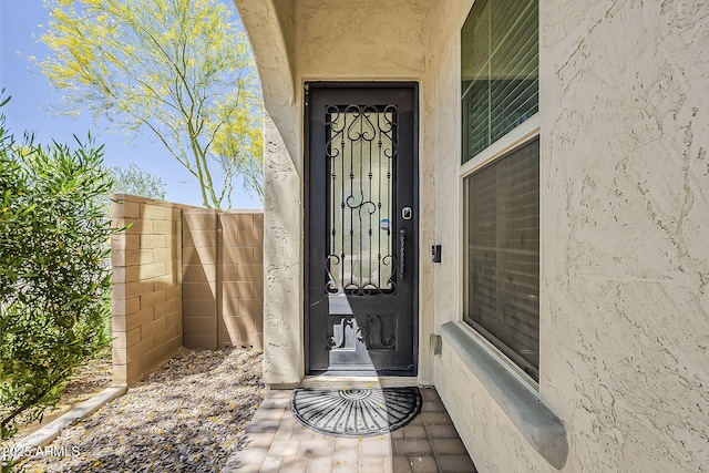 3310 E Los Gatos Dr, Phoenix, AZ 85050 - view of exterior entry featuring stucco siding