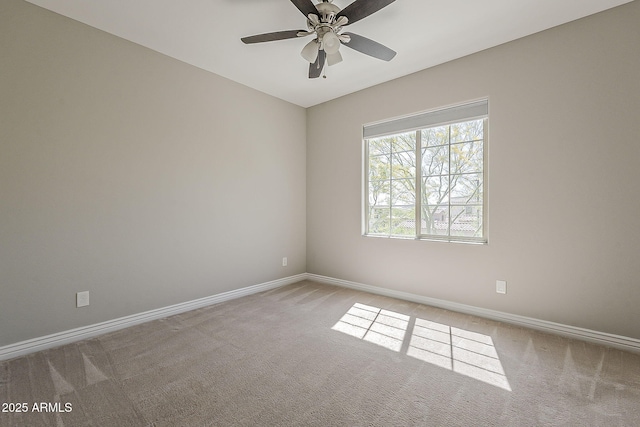 3310 E Los Gatos Dr, Phoenix, AZ 85050 - carpeted spare room with a ceiling fan and baseboards