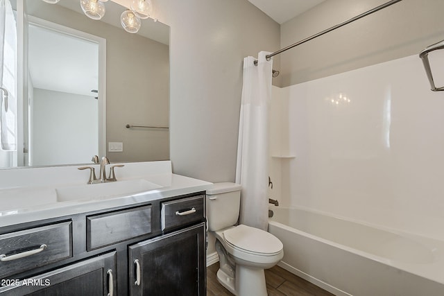 3310 E Los Gatos Dr, Phoenix, AZ 85050 - full bathroom with toilet, wood finished floors, vanity, and shower / bath combo