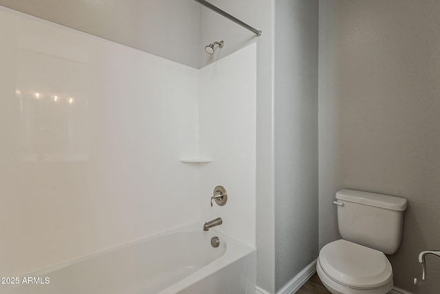 3310 E Los Gatos Dr, Phoenix, AZ 85050 - full bath featuring toilet, washtub / shower combination, and baseboards