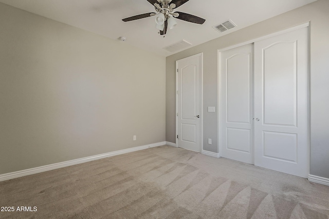3310 E Los Gatos Dr, Phoenix, AZ 85050 - unfurnished bedroom with carpet floors, baseboards, a closet, and ceiling fan