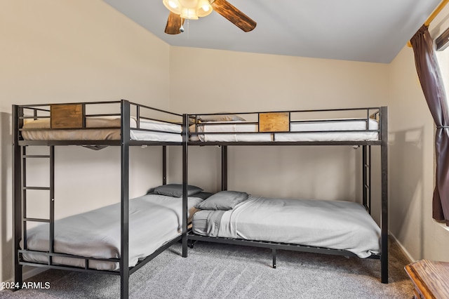 bedroom with ceiling fan and carpet floors