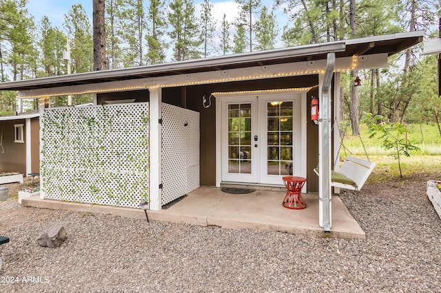 doorway to property featuring french doors