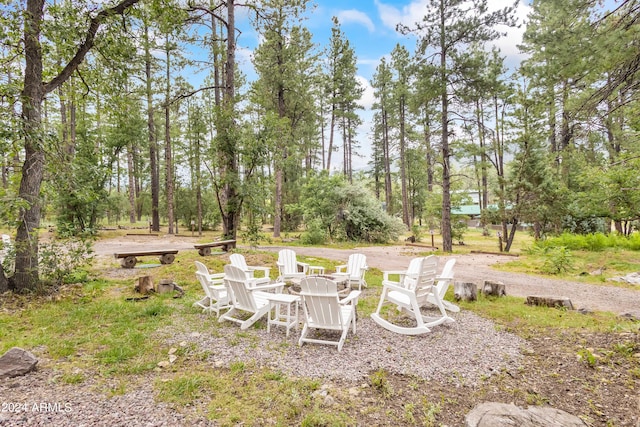 view of yard featuring a fire pit