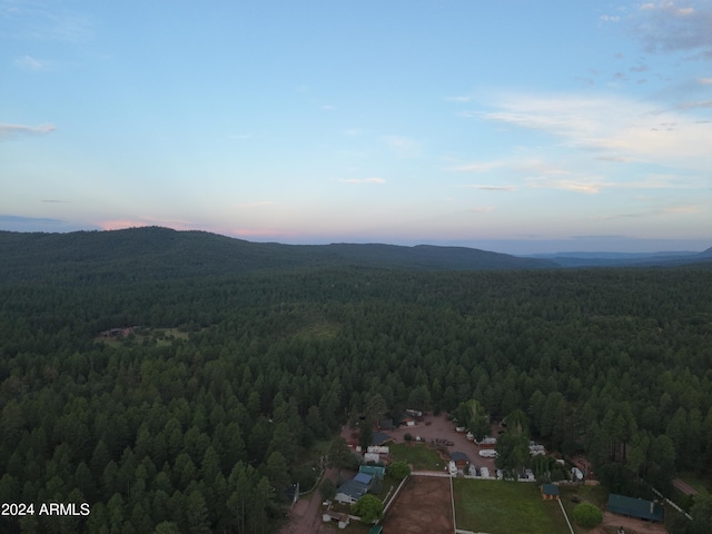 aerial view at dusk with a mountain view