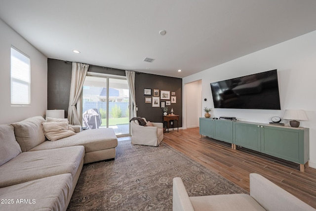10964 W Garfield St, Avondale, AZ 85323 - living room with wood finished floors and recessed lighting