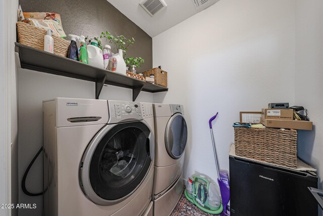 10964 W Garfield St, Avondale, AZ 85323 - laundry area featuring washer and clothes dryer