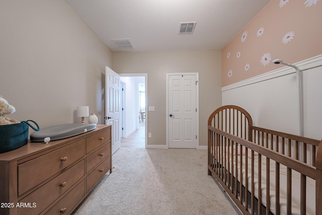 10964 W Garfield St, Avondale, AZ 85323 - bedroom with light carpet and a nursery area