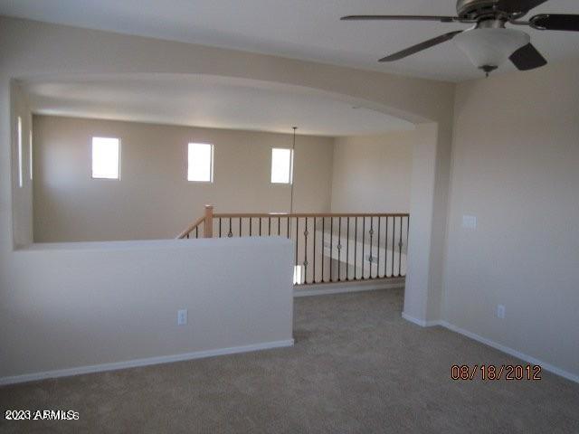 9018 W Superior Ave, Tolleson, AZ 85353 - empty room featuring ceiling fan and carpet flooring