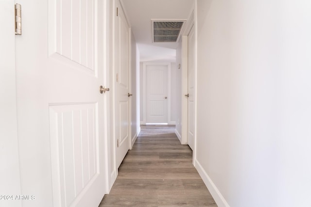 corridor featuring light hardwood / wood-style flooring