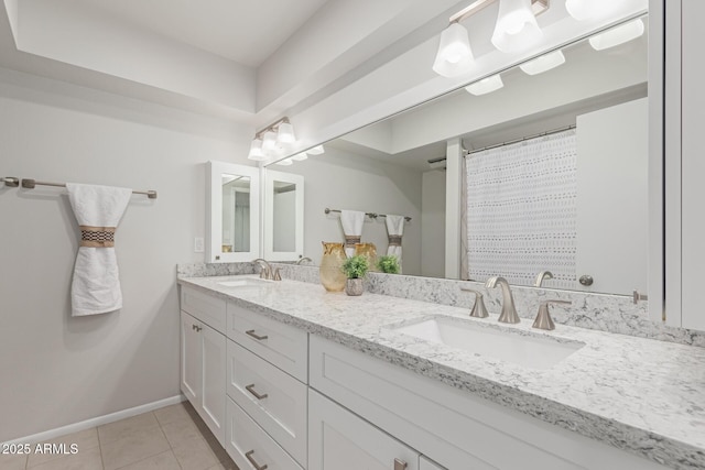 bathroom featuring vanity and tile patterned floors