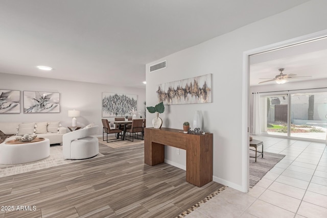 living room with ceiling fan