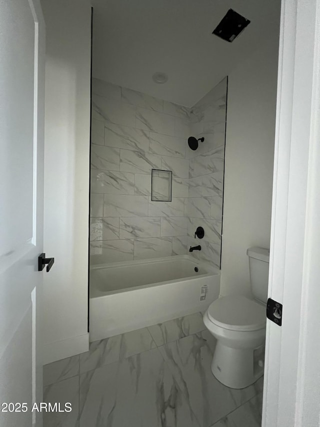 3755 N 363rd Ave, Tonopah, AZ 85354 - full bathroom with marble look tile flooring, toilet, and shower / bath combination