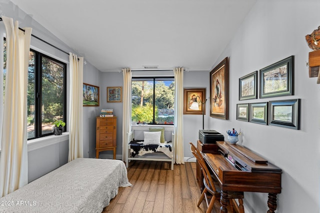 bedroom featuring hardwood / wood-style flooring