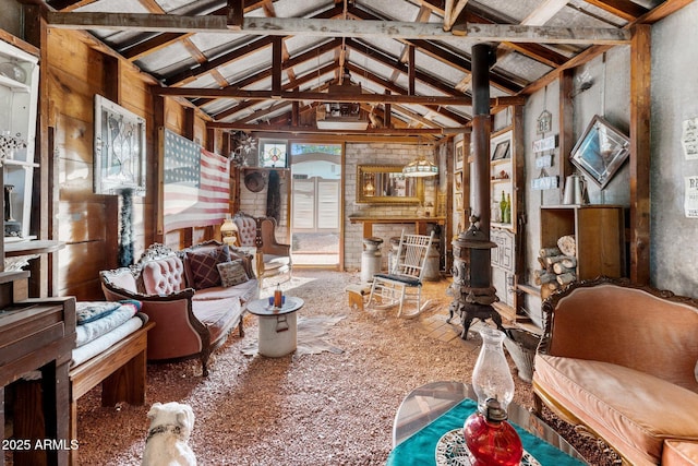 sitting room featuring carpet flooring, high vaulted ceiling, and beam ceiling