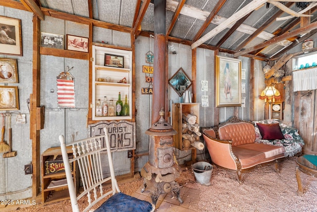 living area with vaulted ceiling with beams