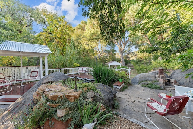 view of patio with a gazebo and a deck