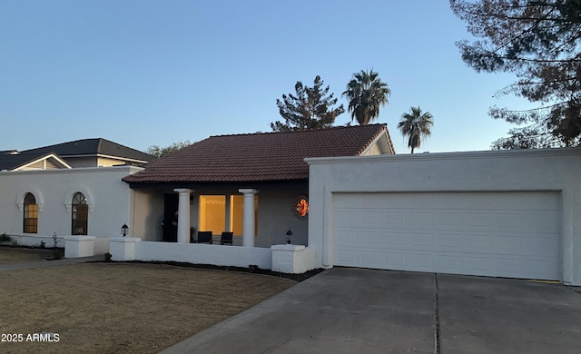 view of front of house with a garage