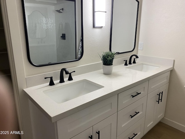 bathroom featuring vanity and walk in shower