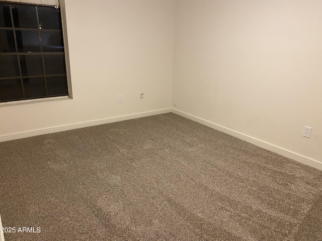 unfurnished room with carpet