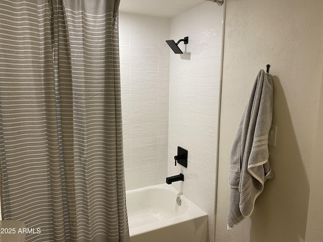 bathroom with shower / bathtub combination with curtain