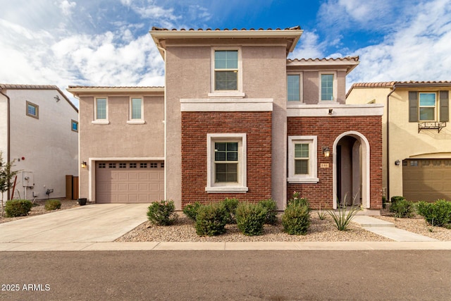 mediterranean / spanish-style home featuring a garage