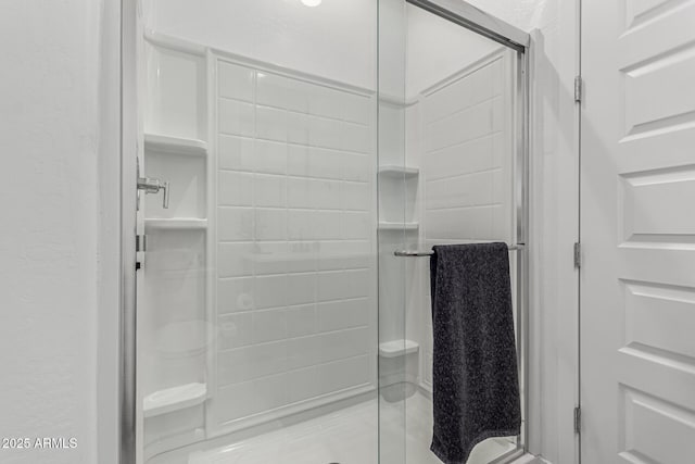 bathroom with an enclosed shower