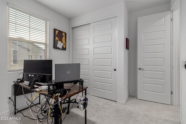 office area with light colored carpet