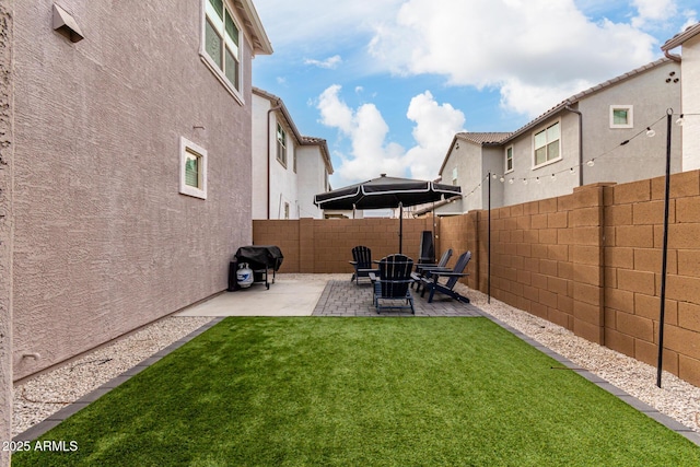 view of yard with a patio area