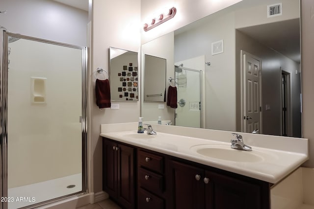 bathroom featuring vanity and walk in shower