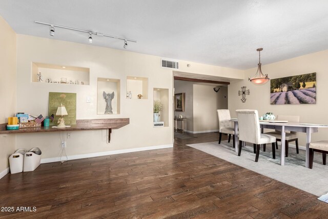 2843 E Captain Dreyfus Ave, Phoenix, AZ 85032 - dining room with hardwood / wood-style floors and rail lighting